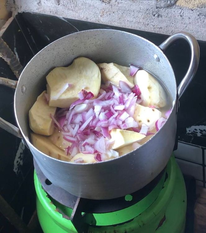Step 1.3: Add chopped onions, 2 seasoning cubes, 8 freshly coarsely ground pepper, and ground crayfish
