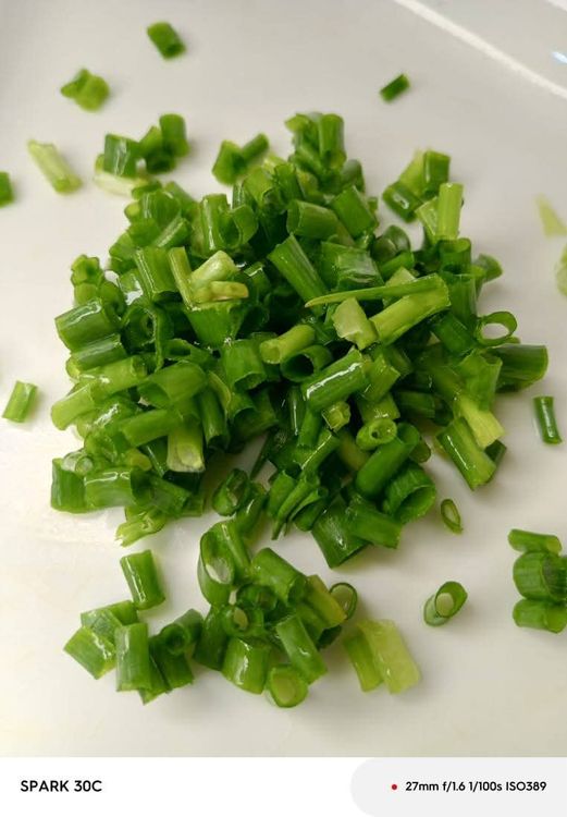 Step 1.2: Chop the onions and wash the spring onions properly before cutting them