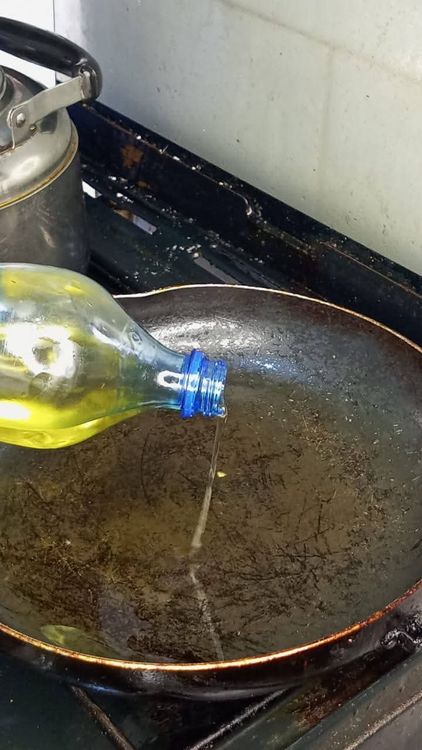Step 2.1: Heat a small amount of oil in a pan
