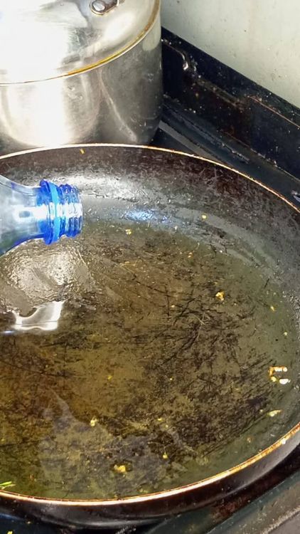 Step 2.1: Pour a small amount of oil into a pan for the main cooking and set aside