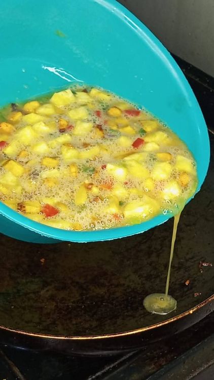 Step 2.1: Heat the oil in the pan and pour the mixture evenly over the pan