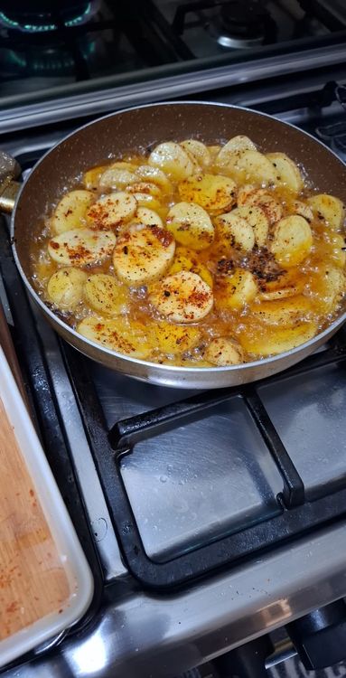 Step 1.5: Heat oil in a pan and fry the potato slices until both sides are golden brown and crispy