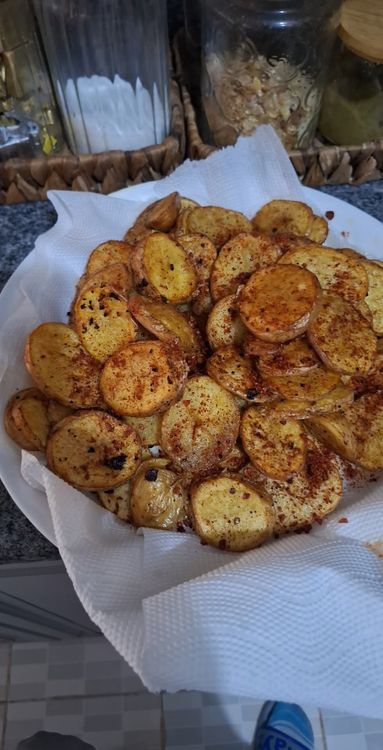 Step 1.2: Drain the fried potatoes on paper towels to remove excess oil