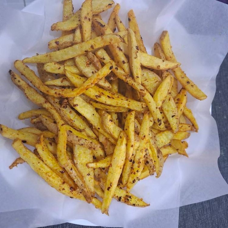 Step 1.4: Drain the fried chips on paper towels to remove excess oil