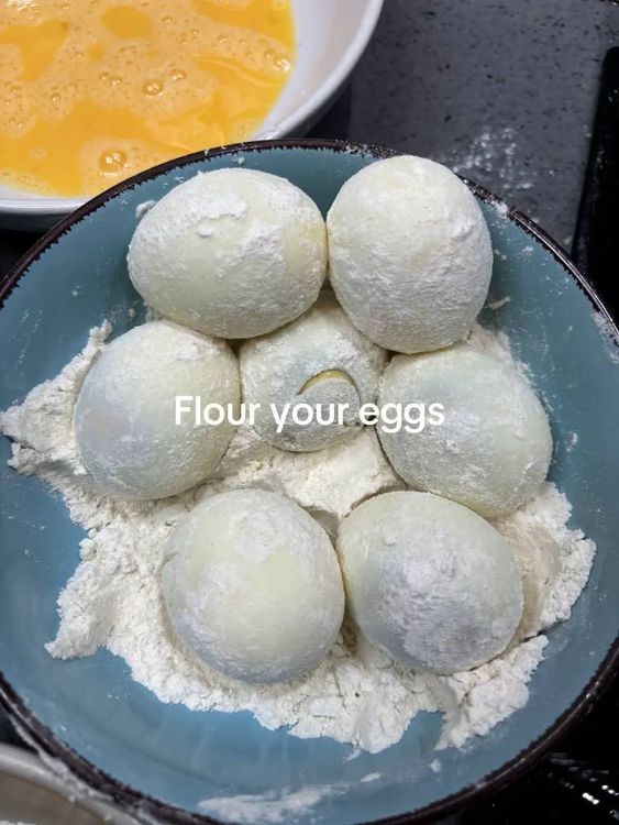 Step 3.1: Coat the boiled eggs with flour