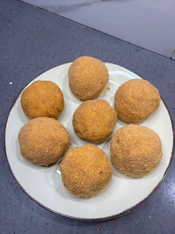 Step 3.2: Gently egg wash the bun, then coat it with bread crumbs