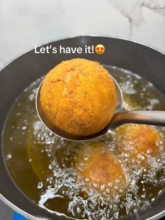 Step 4.2: Fry the coated buns until they are golden brown
