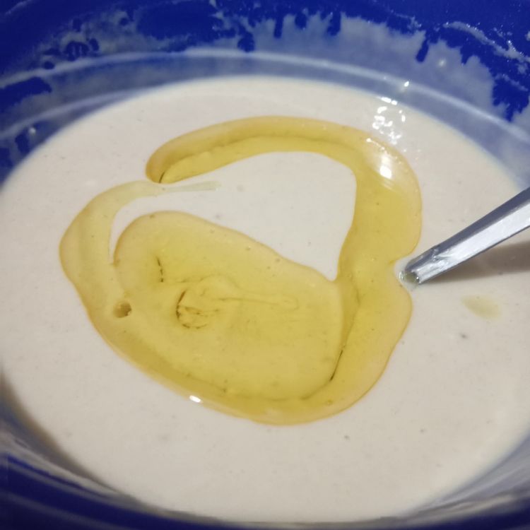 Step 1.1: Add cooking oil or melted butter to the batter and mix properly