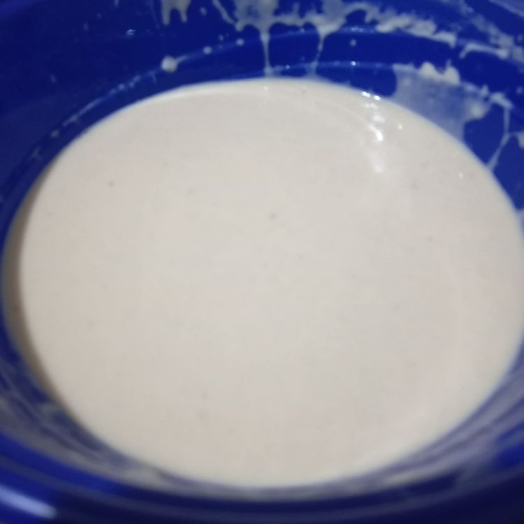 Step 1.2: Add cooking oil or melted butter to the batter and mix properly
