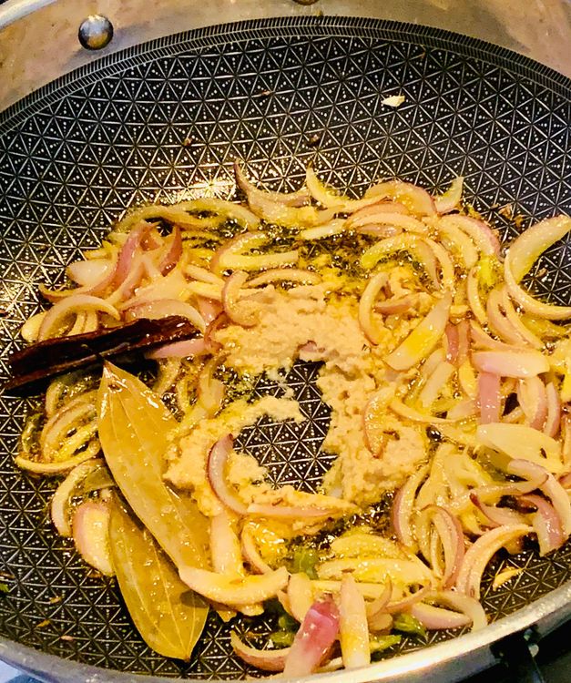 Step 1.1: Add ginger-garlic paste and fry for a few seconds