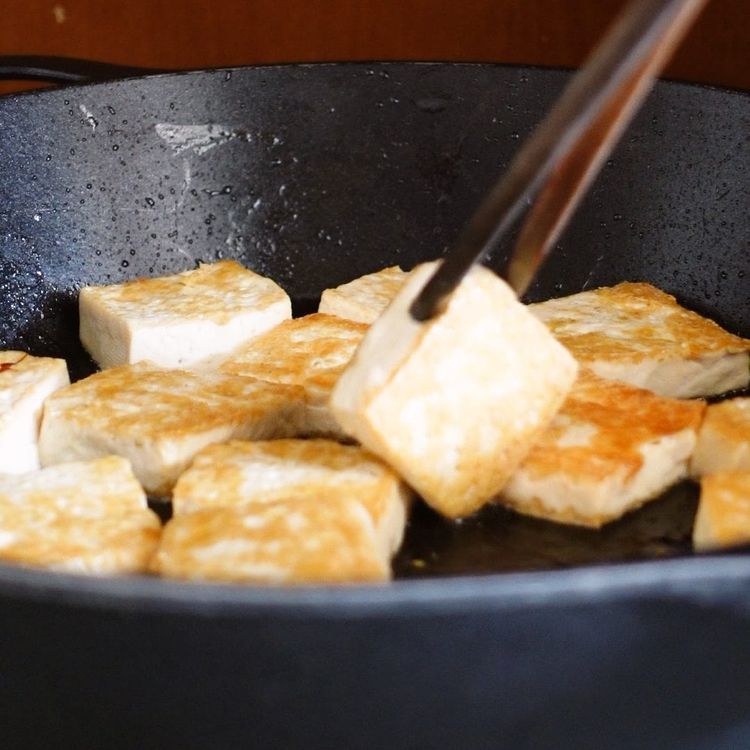 Step 2.1: Fry the tofu in oil until golden brown on both sides
