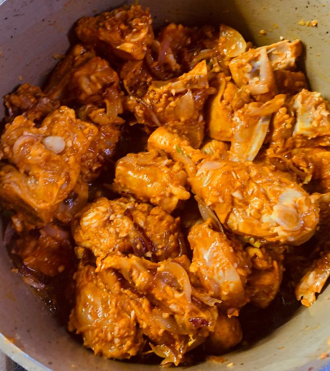 Step 3.1: Add the marinated chicken pieces and cook for 4-5 minutes until the chicken pieces have lightened in colour