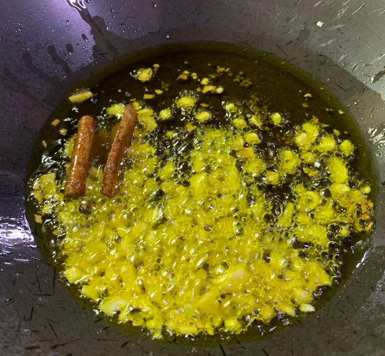 Step 1.1: Add chopped garlic and stir for a minute
