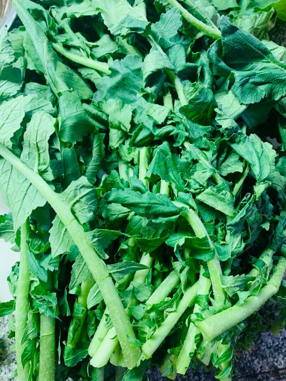 Step 1.1: Remove the hard stems from the bunch of radish leaves