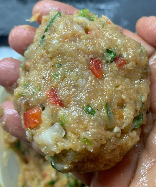 Step 1.1: Take a small amount of the chicken mixture and shape it into a ball using your hands