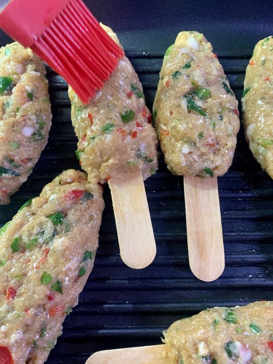 Step 1.2: Check the underside of the kebabs for grill lines