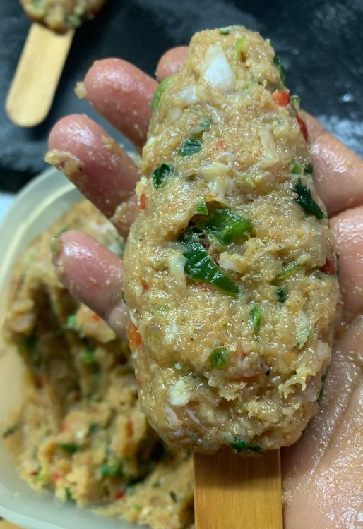 Step 1.2: Thread the chicken balls onto the ice cream sticks/skewers