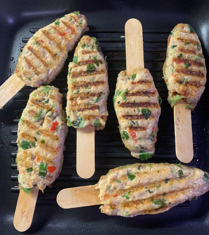Step 1.3: Check the underside of the kebabs for grill lines