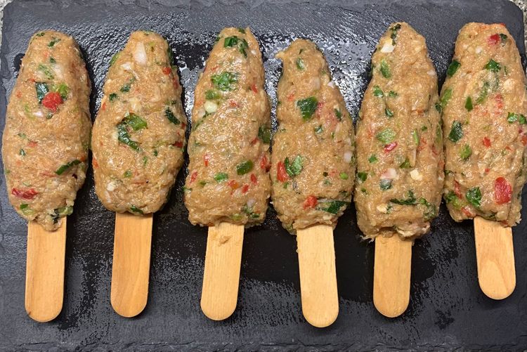 Step 1.3: Thread the chicken balls onto the ice cream sticks/skewers