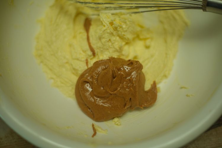 Step 1.1: **add peanut butter to the sugar and butter mix and beat for 1min**
