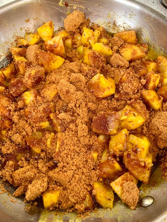 Step 2.1: Gradually stir in the jaggery powder, mixing well with the lemons