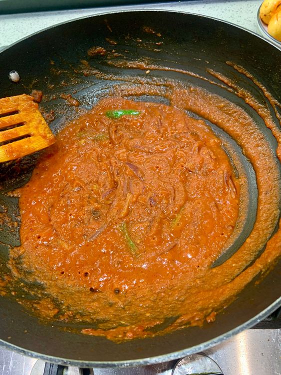 Step 3.1: Add tomatoes and green chillies