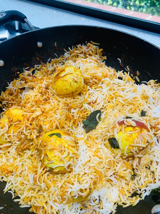 Step 5.1: Fluff the biryani gently before serving