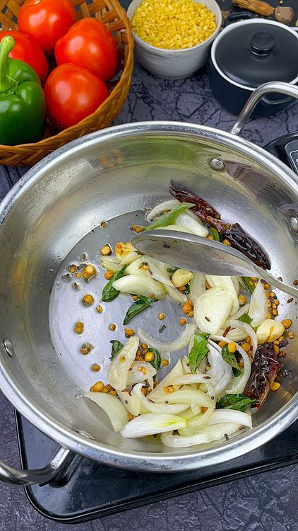 Step 4.1: Add sliced onions and turmeric powder