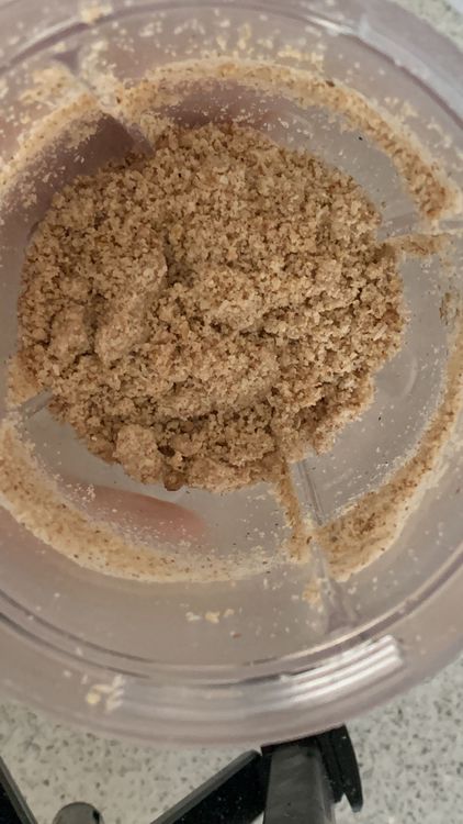 Step 2.2: Using a mixer grinder, finely grind poppy seeds, almonds, sesame seeds, desiccated coconut, and coriander seeds until it forms a smooth powder