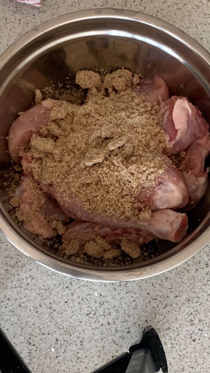 Step 2.2: Put the chicken pieces in a mixing bowl and add the ground mixture, curd, red chilli powder, salt, ginger and garlic
