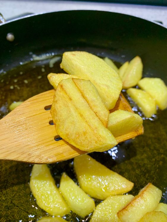 Step 1.1: Add 1 tsp salt and fry the potatoes until golden around the edges and half-cooked