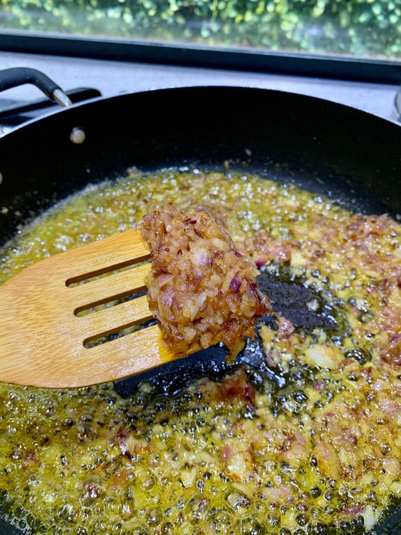 Step 2.2: In the same pan, add the chopped onions and the remaining 1 tsp salt