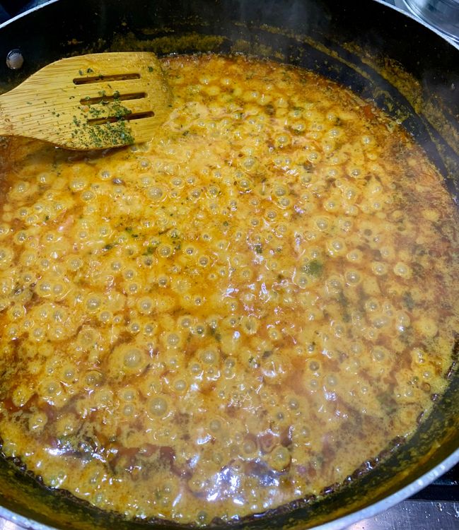 Step 3.2: Pour in the milk and add crushed kasuri methi