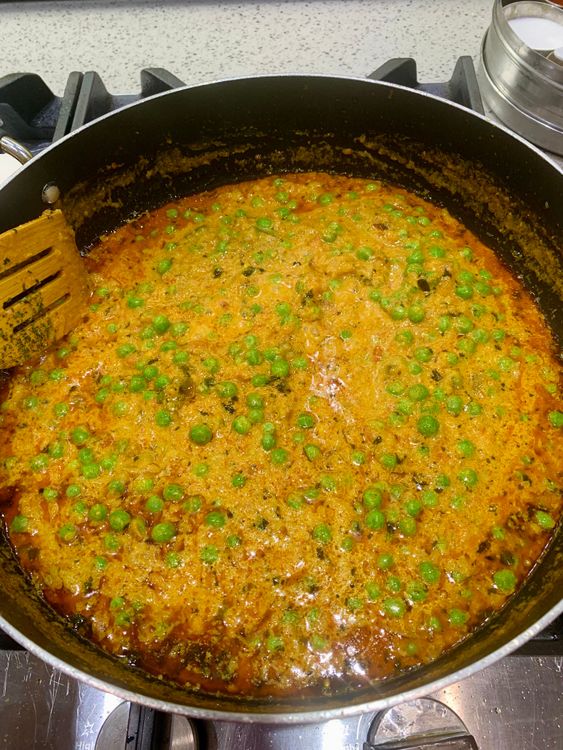 Step 4.2: Mix in the peas and cook for a minute