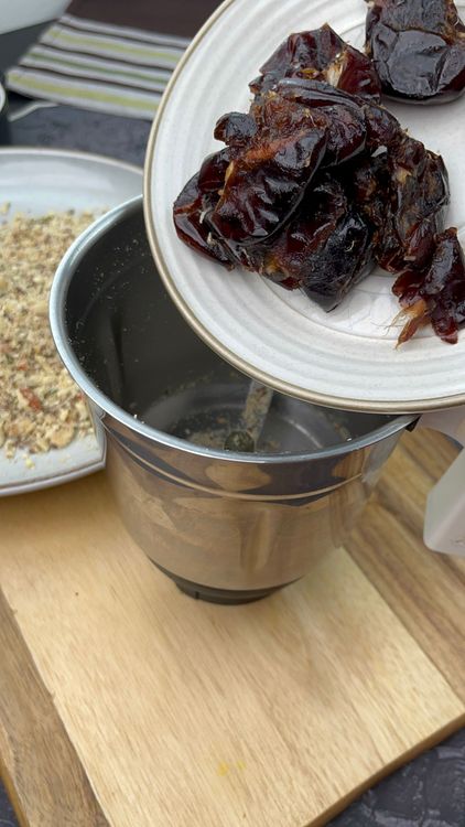 Step 5.2: Add 1 tsp ghee and roast seedless dates for 5–6 minutes on low flame until soft, then set aside