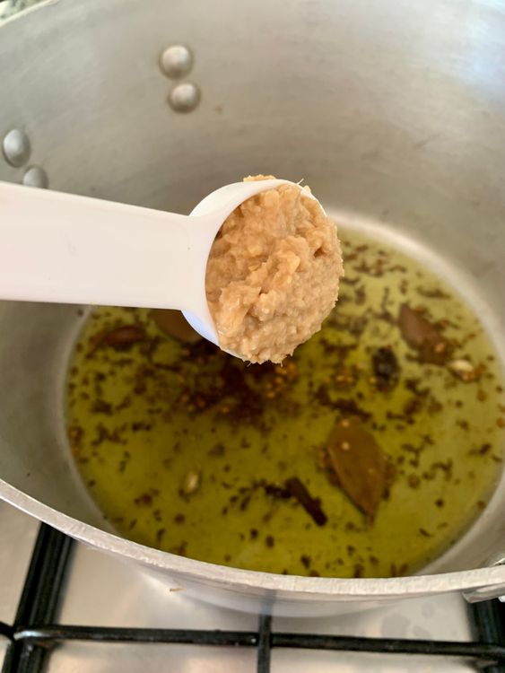 Step 3.1: Add the ginger-garlic paste and stir it for a minute