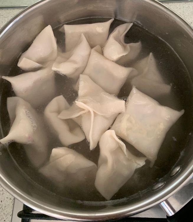 Step 4.1: Gently place the wontons in the boiling water and cook for 3-4 minutes, or until they float to the surface, indicating they are cooked