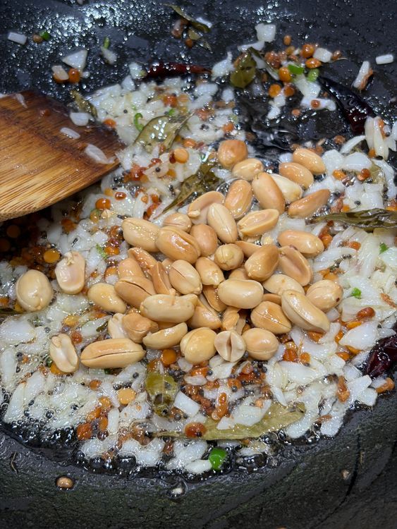 Step 1.1: Return the roasted peanuts to the pan