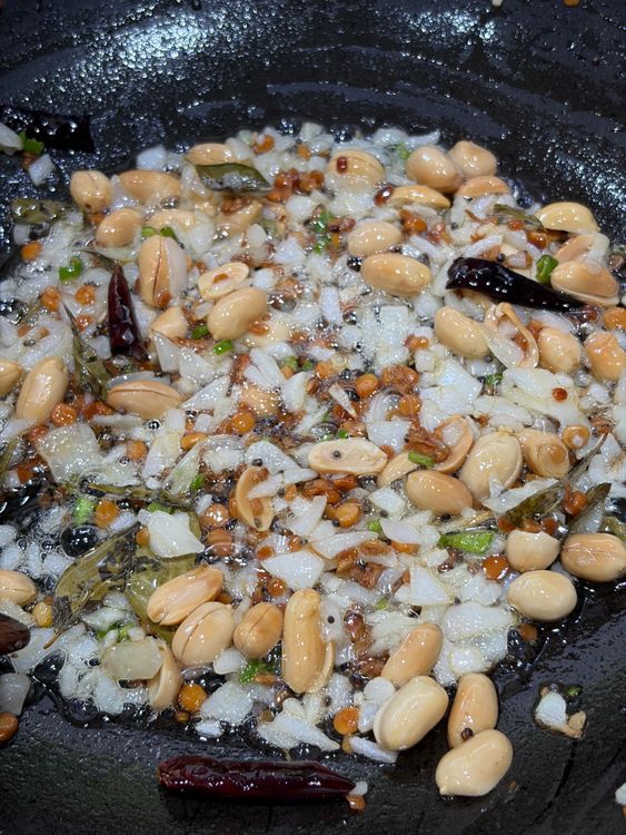 Step 1.2: Return the roasted peanuts to the pan