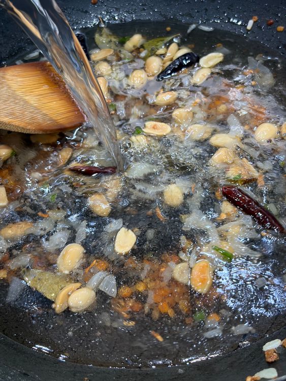 Step 1.1: Pour in the water, add salt, and bring it to a boil