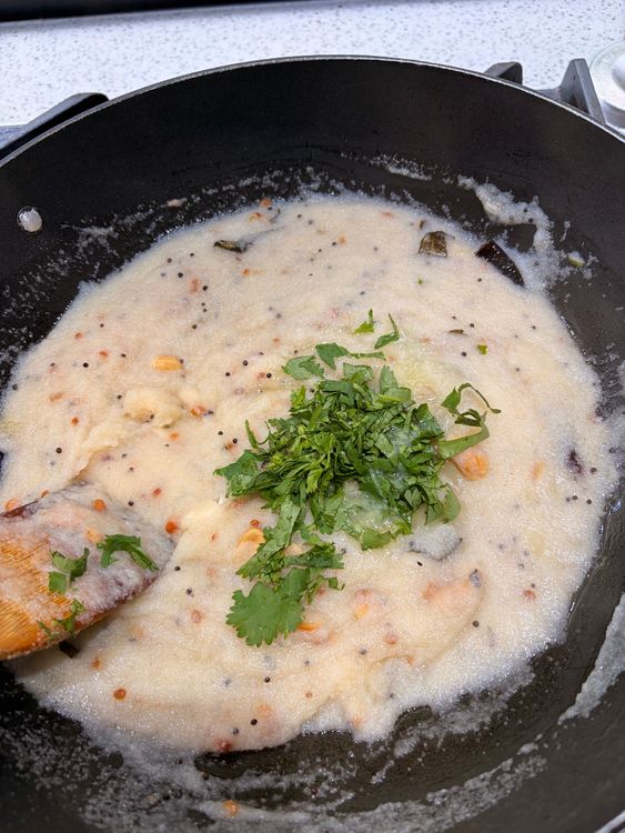 Step 1.1: Add lemon juice and coriander leaves; gently fluff and mix