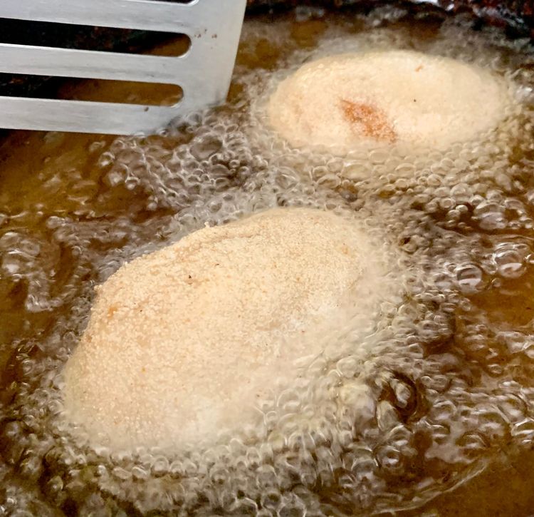 Step 1.1: Add the bread rolls one at a time and leave it for a minute