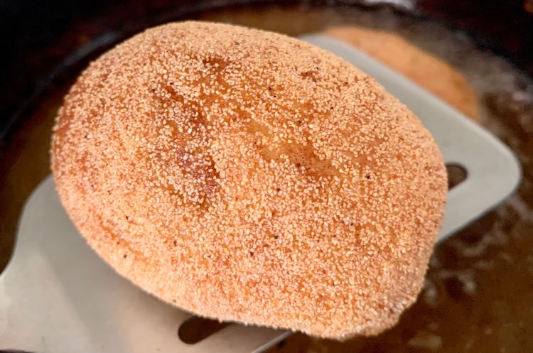 Step 1.1: Turn the rolls in intervals with a ladle till they turn golden brown