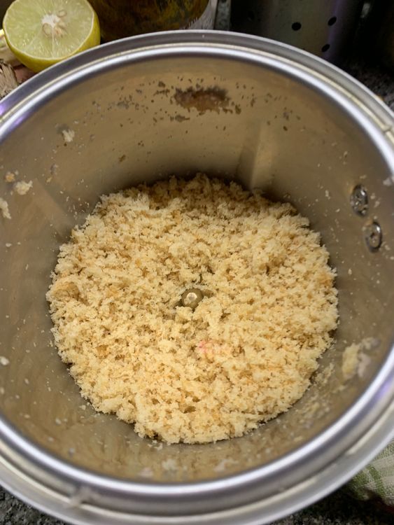 Step 1.1: Place the bread slice in a food processor and pulse until it becomes fine crumbs
