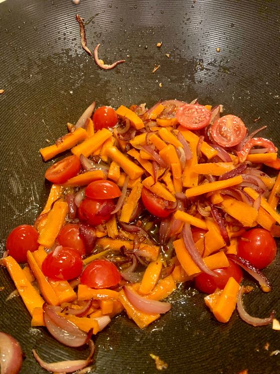 Step 2.1: Next, add the cherry tomatoes and cook for another 2-3 minutes or until they are mushy