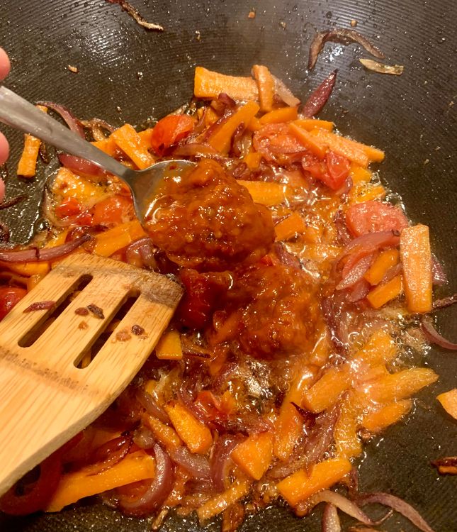 Step 2.1: Stir in the schezwan sauce, oregano, mixed herbs, white pepper powder, black pepper powder, dried basil leaves, and salt according to your taste