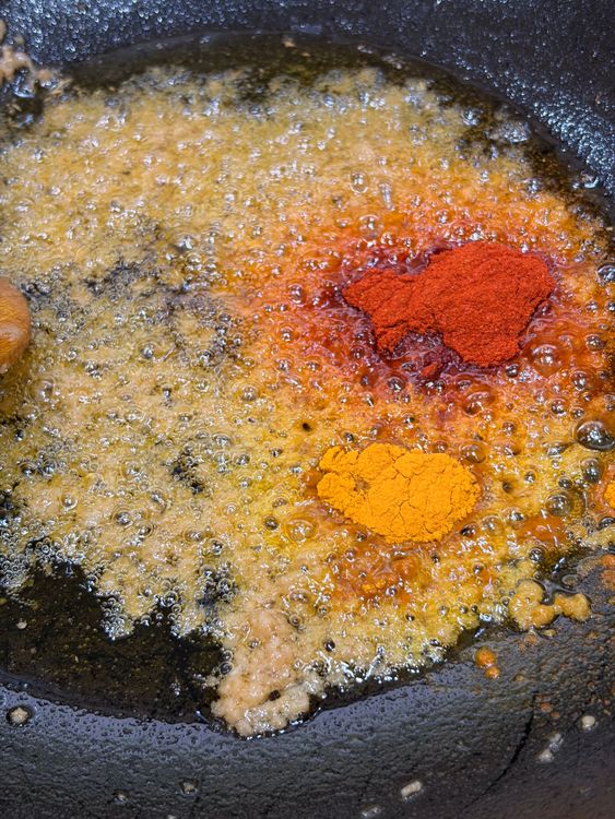 Step 3.1: Add Kashmiri/Degi mirch and turmeric