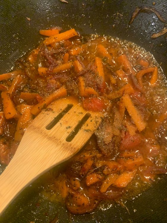 Step 2.3: Stir in the schezwan sauce, oregano, mixed herbs, white pepper powder, black pepper powder, dried basil leaves, and salt according to your taste