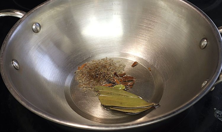 Step 1.5: Heat oil in a heavy-bottomed pan over medium heat