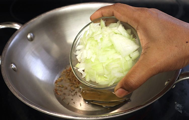 Step 1.1: Add chopped onions and green chillies